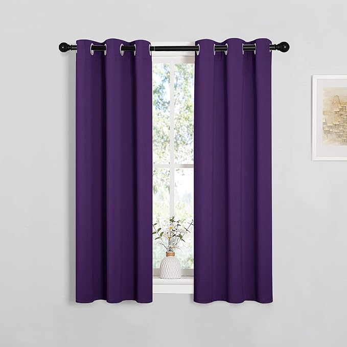 NICETOWN Thermal Insulated Blackout Draperies Curtains, Triple Weave Home Decoration Solid Ring Top Blackout Drape Panels for Bedroom (Set of 2, 29 x 45 Inch, Royal Purple)