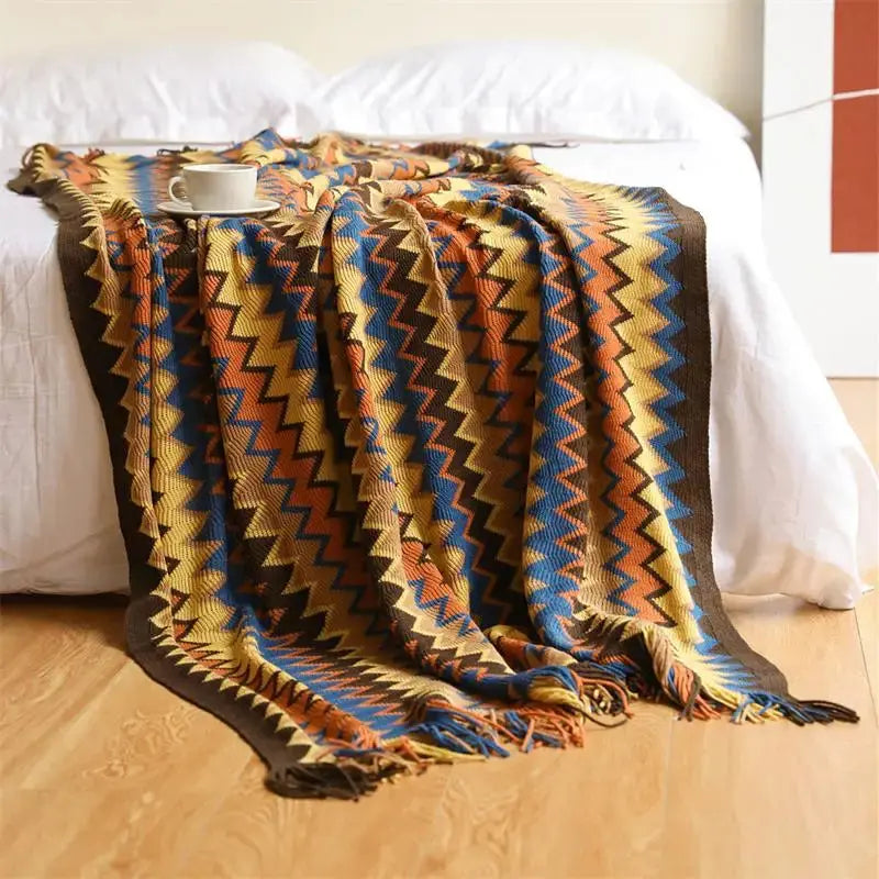 Couverture tricotée à la main avec pompon